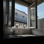 Parisian Flat Under The Roofs